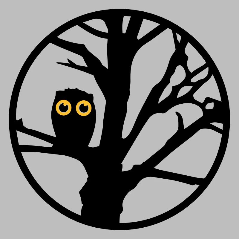 Eine Eule sitzt auf einem Baum