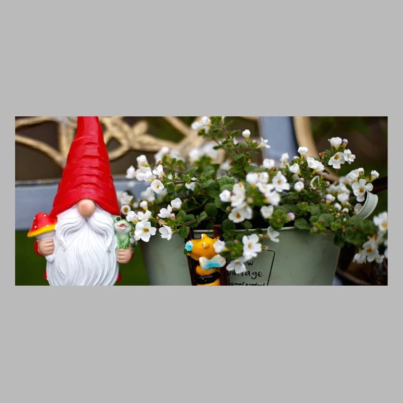 Gartenwichtel im Blütentopf