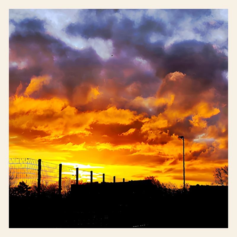 Coucher de soleil – Couleurs de feu dans le ciel du soir