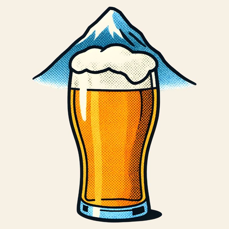 Verre à bière devant le sommet de la montagne
