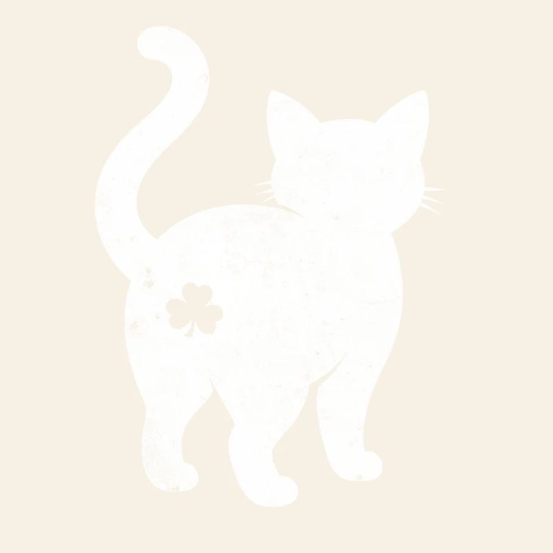 Silhouette de chat avec trèfle