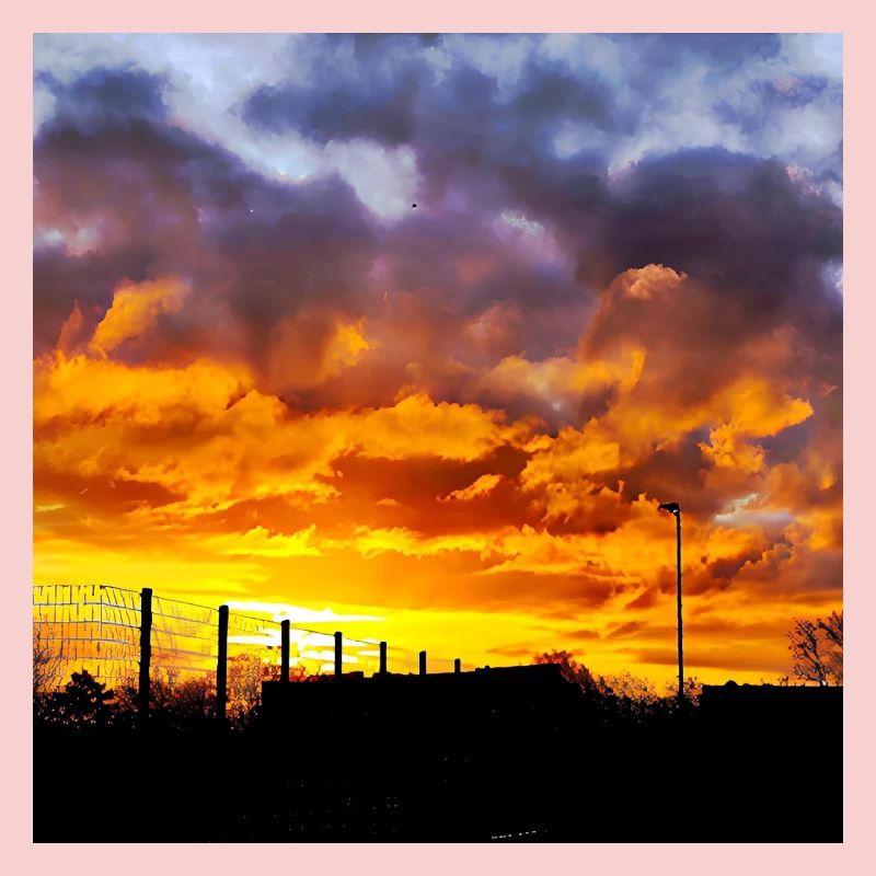 Coucher de soleil – Couleurs de feu dans le ciel du soir
