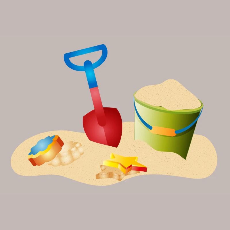 Jouets de sable sur la plage ou dans le bac à sable