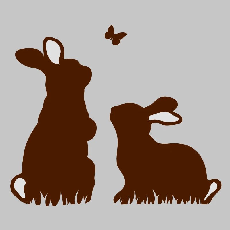 Two rabbits watching a butterfly