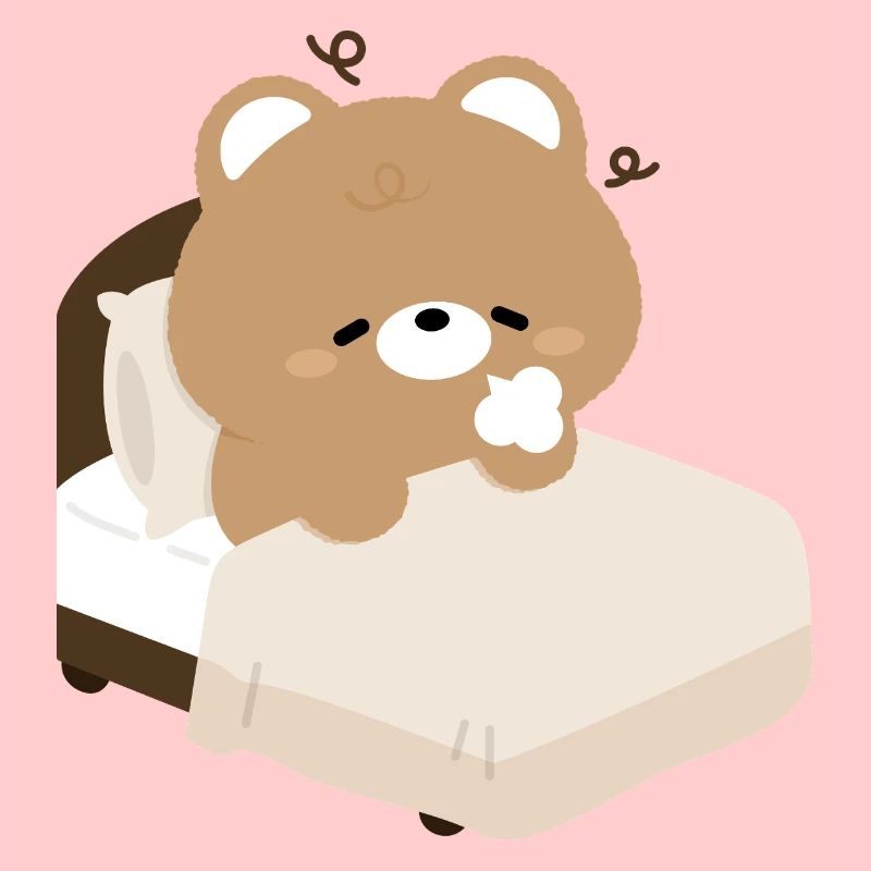 Ours endormi sur le lit