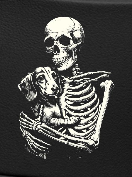 Skeleton hugging dachshund