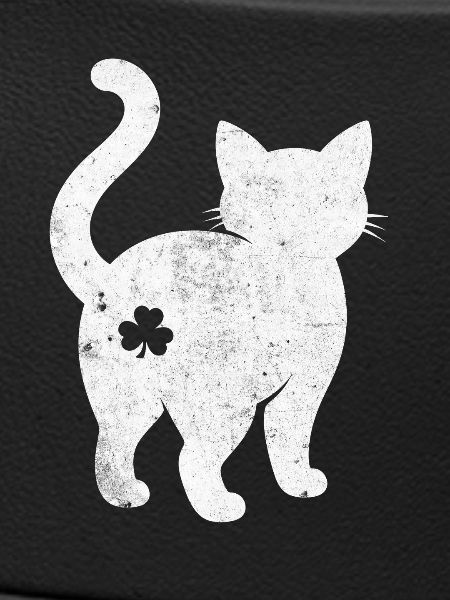 Silhouette de chat avec trèfle