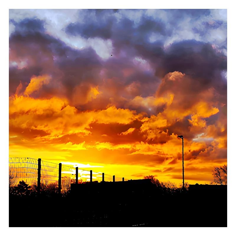 Coucher de soleil – Couleurs de feu dans le ciel du soir