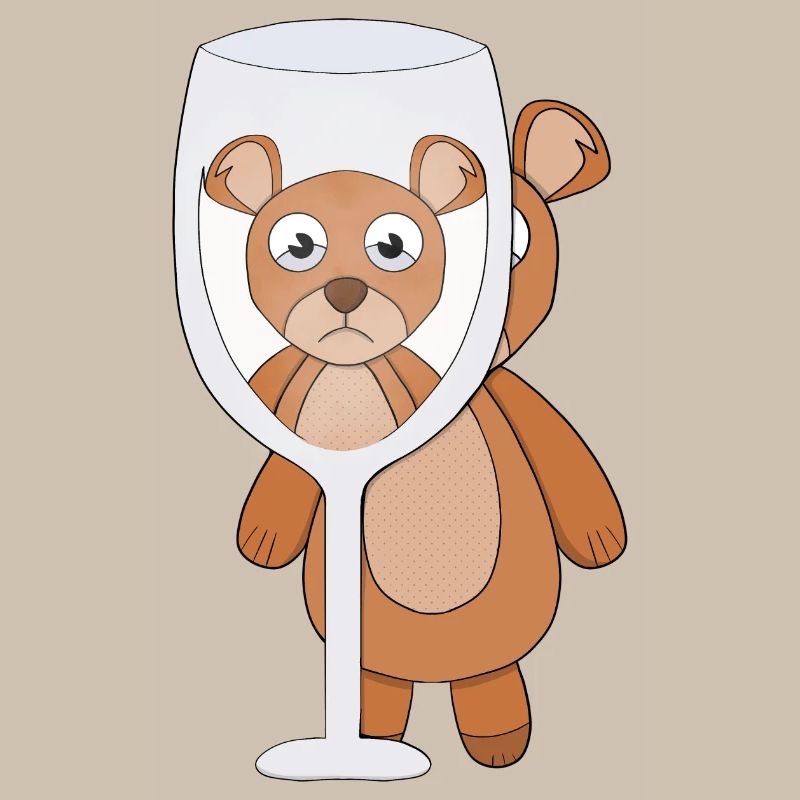 A teddy bear and empty glass
