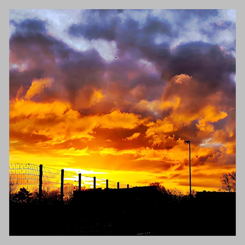 Coucher de soleil – Couleurs de feu dans le ciel du soir