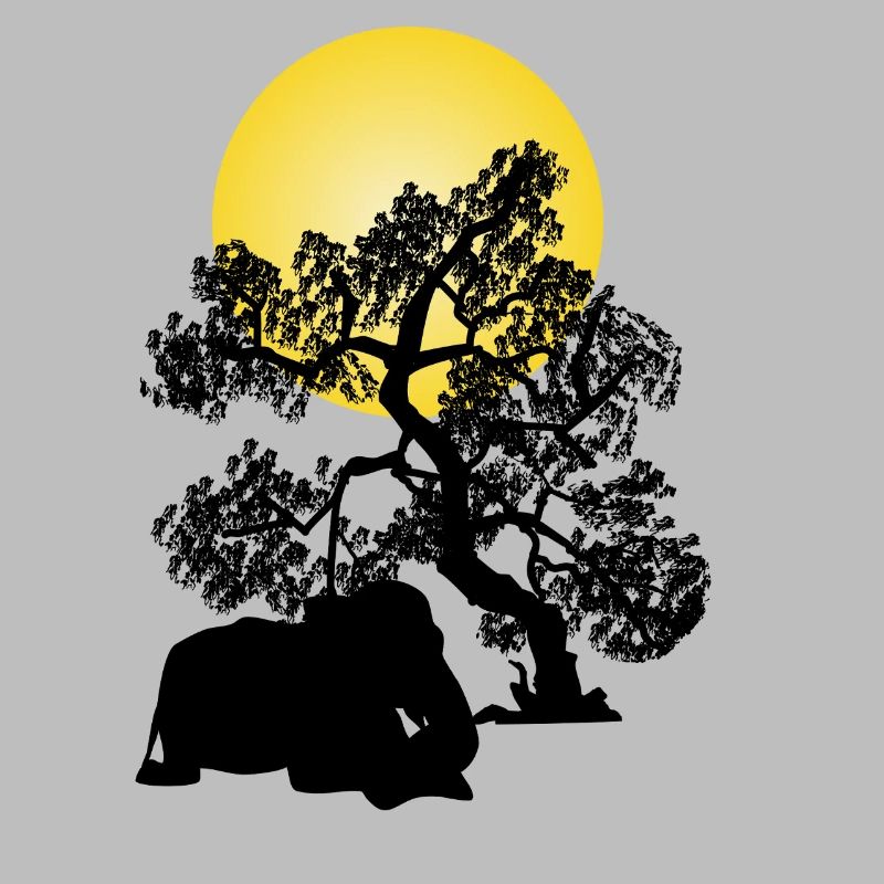 Yellow moon over tree silhouette