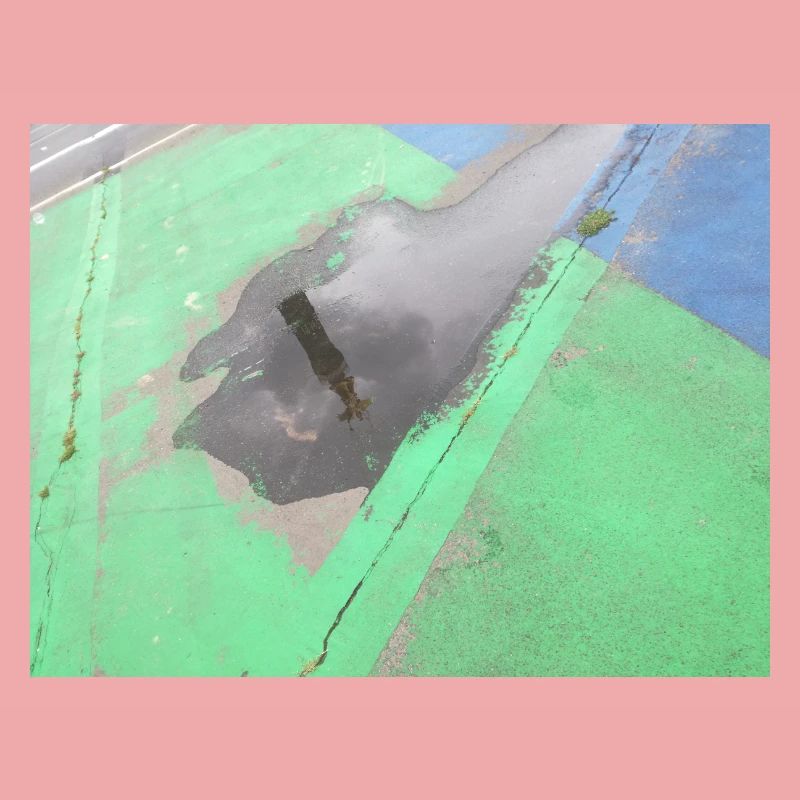CSD Berlin (mirrored Victory Column in the puddle)