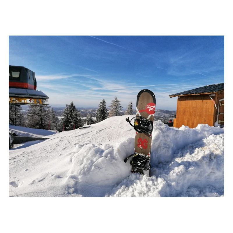 Snowboarding on a sunny slope