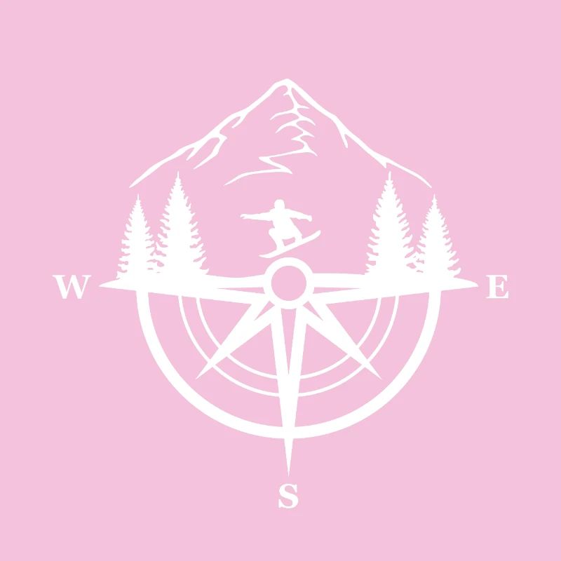 Snowboarder and compass in the mountains
