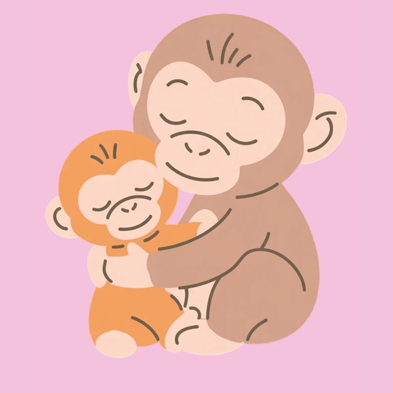 Les singes s’embrassent : Mère et Bébé
