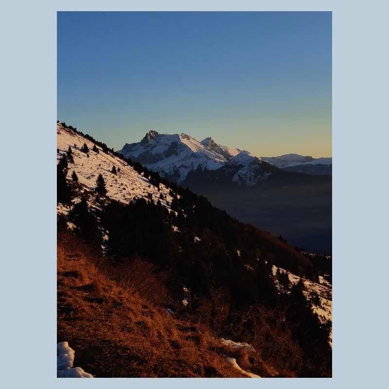 Sunset over snow-capped peaks