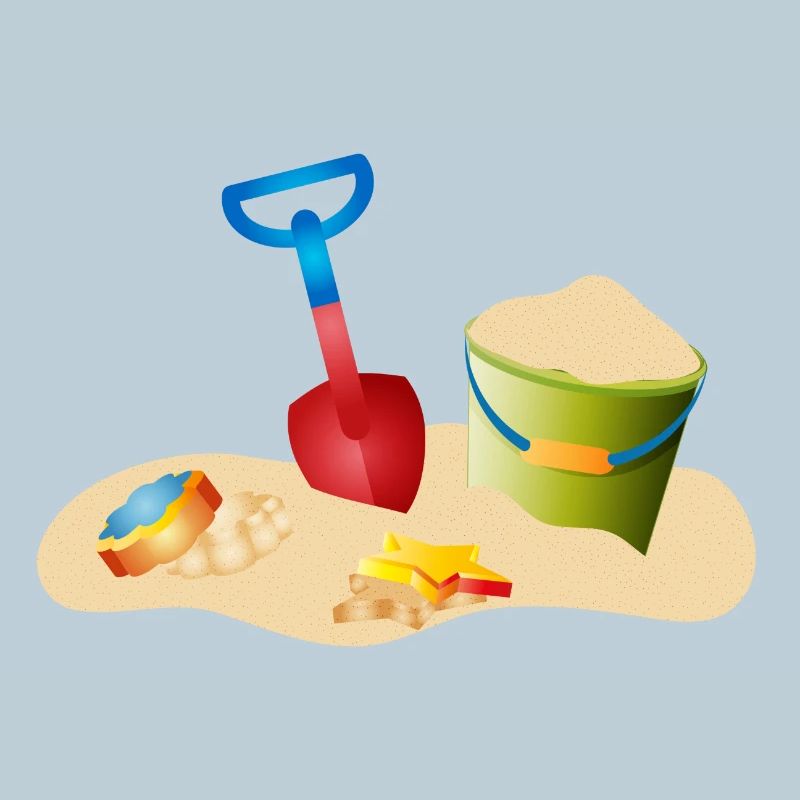 Jouets de sable sur la plage ou dans le bac à sable