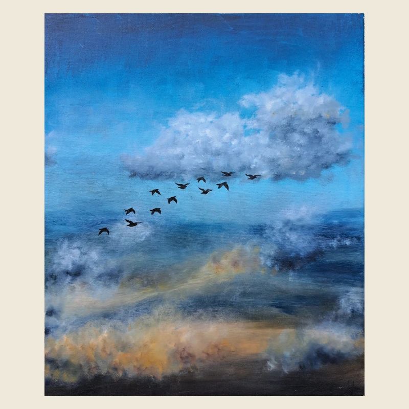 Birds in Flight Over a Cloudy Sky