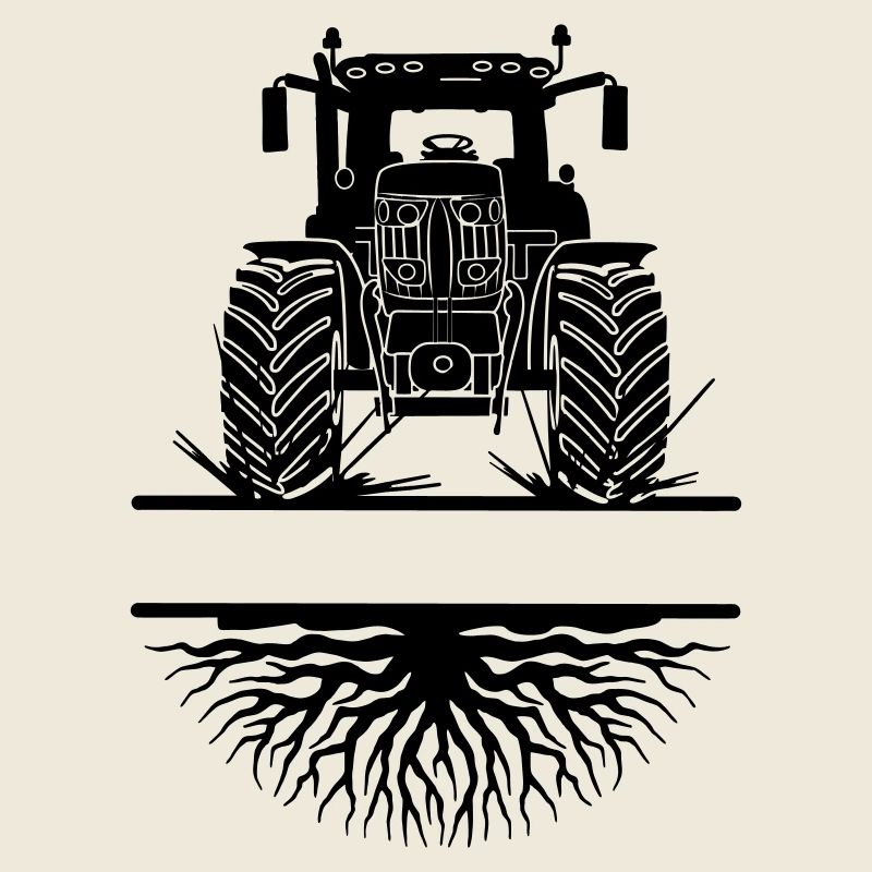 Tracteur dans la boue sous les racines en croissance