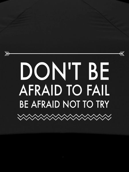 Action Over Fear Quote White