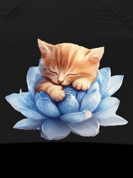 Kitten resting on blue succulents