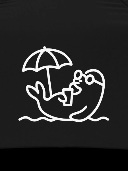 Beach lounger with umbrella