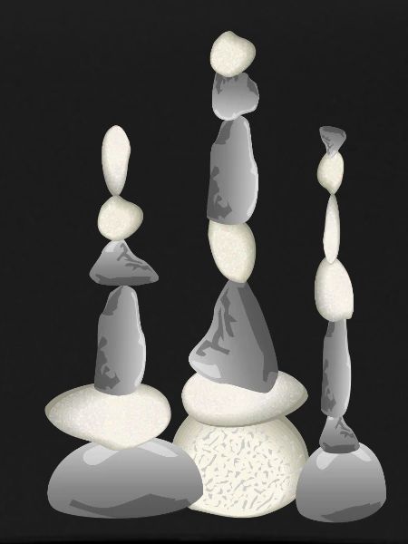 Three Zen-style balancing stone towers