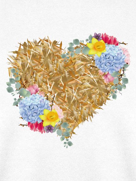 Herz aus Stroh mit Frühlingsblumen