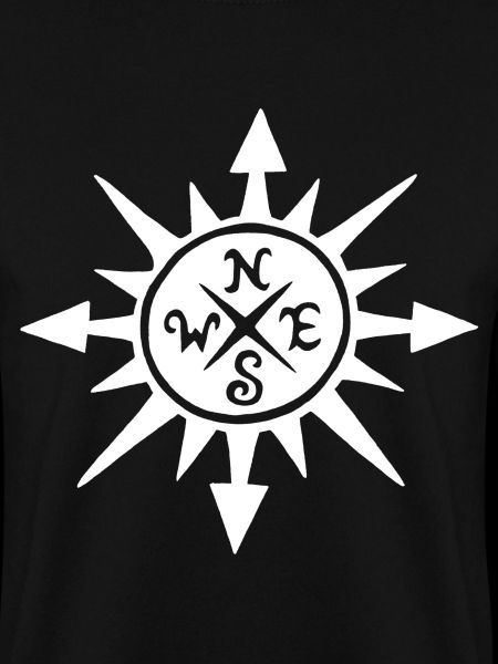 White sun and compass