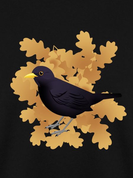 Amsel auf Herbstlaub