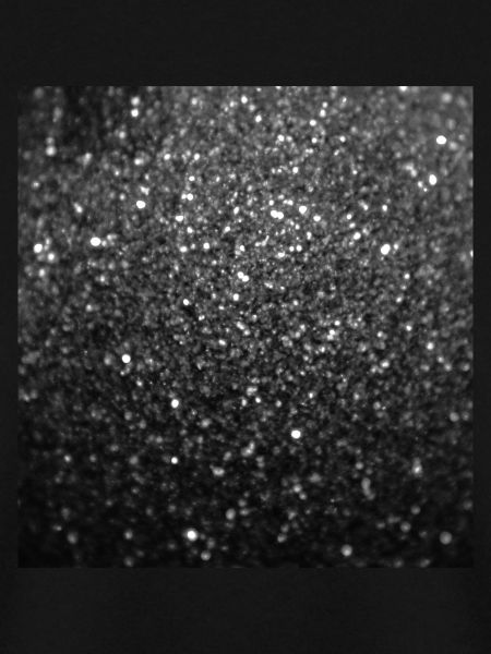 Funkelnder schwarzer Glitter