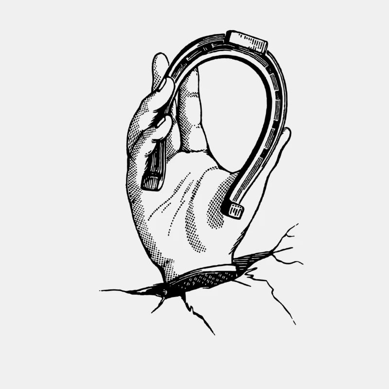 Hand with horseshoe