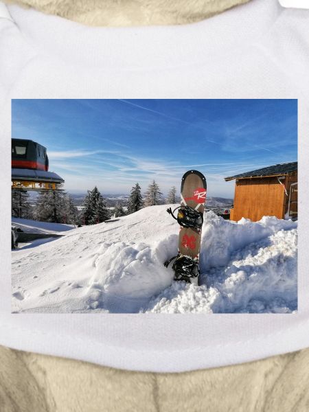 Snowboarding on a sunny slope