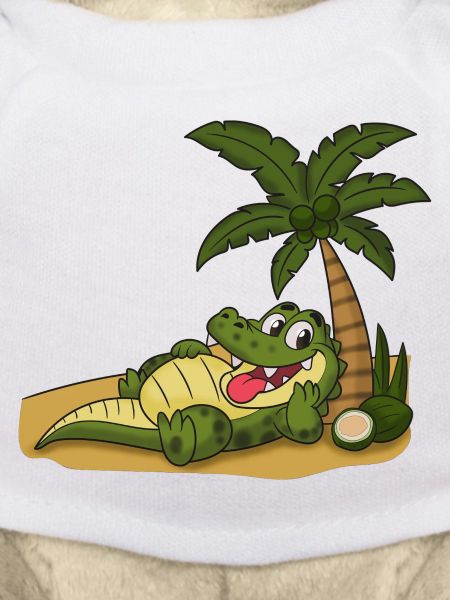 Crocodile on the palm beach