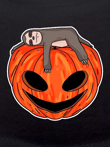 Sloth sleeping on pumpkin