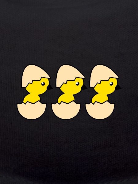 Three hatching chicks