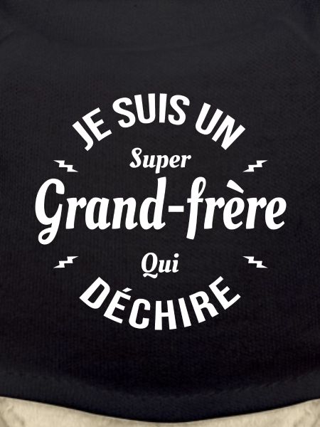 GRAND-FRÈRE QUI DÉCHIRE