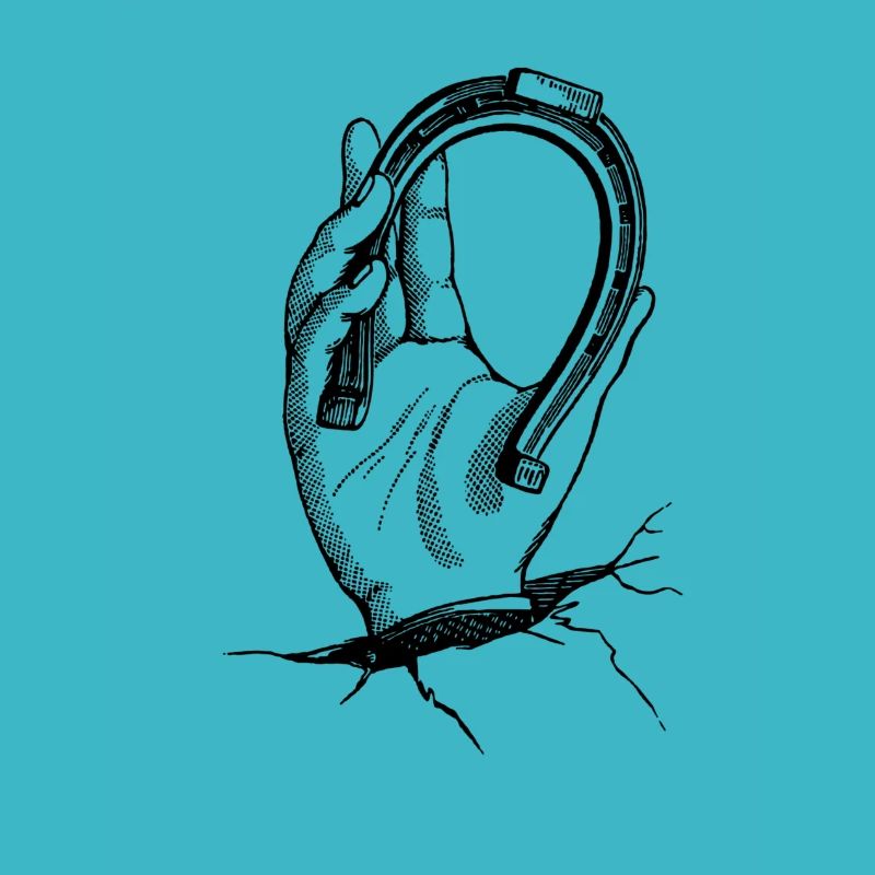 Hand with horseshoe