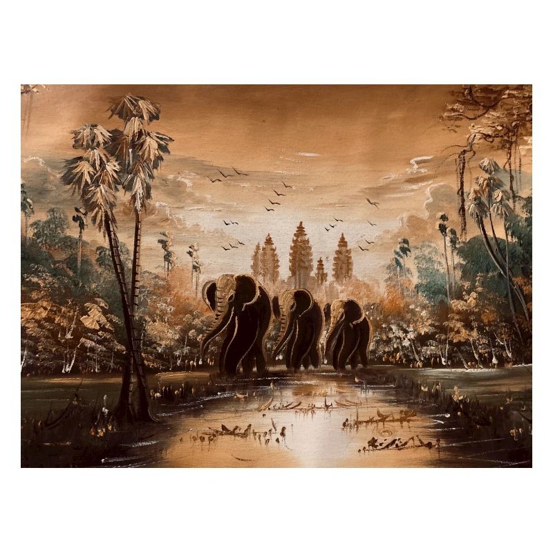 Three elephants and a palm