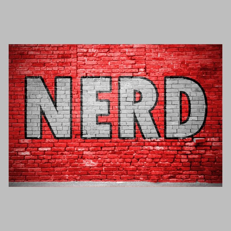 Graffiti de nerd sur un mur de briques