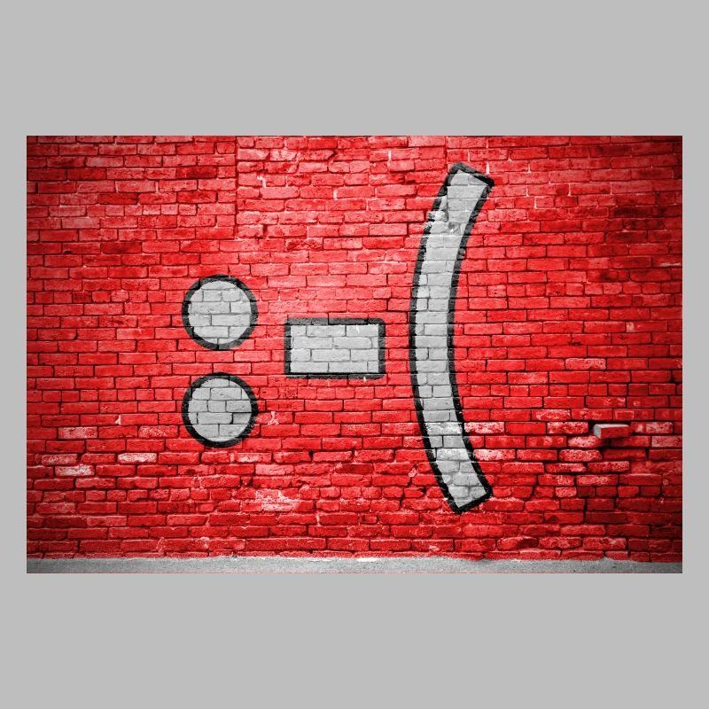 negative Smiley lettering saying Graffiti :-(
