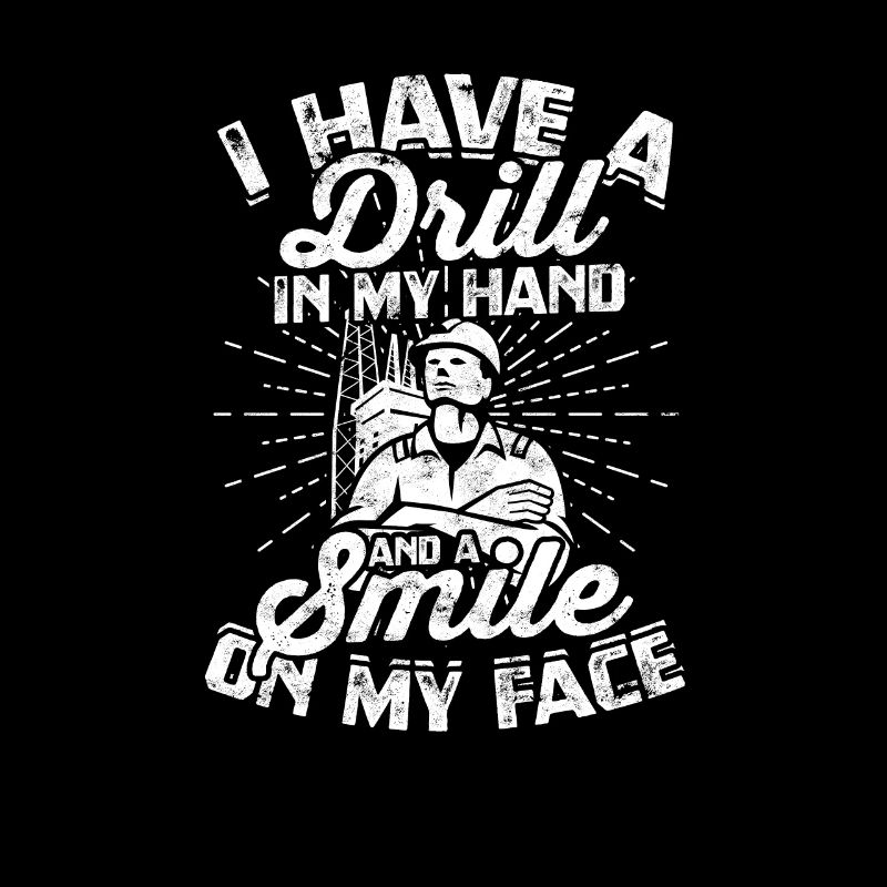 J’ai une perceuse à la main et un sourire sur mon visage