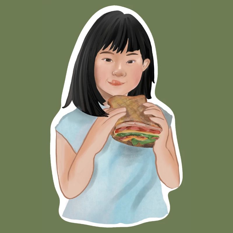 Aranja eats sandwich