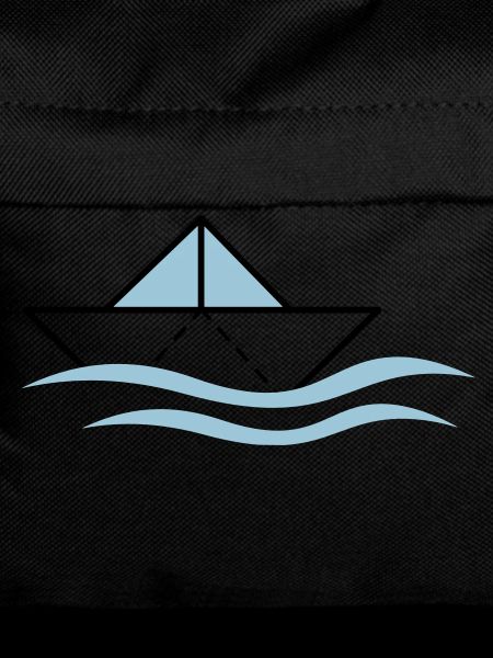 Paper boat on waves
