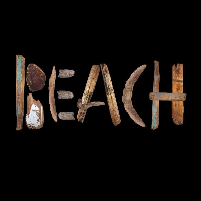 Natural Flotsam Letter Design