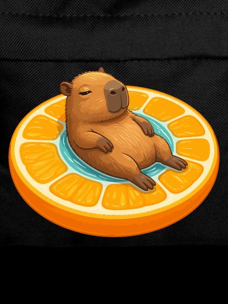 Relaxed capybara on orange slice