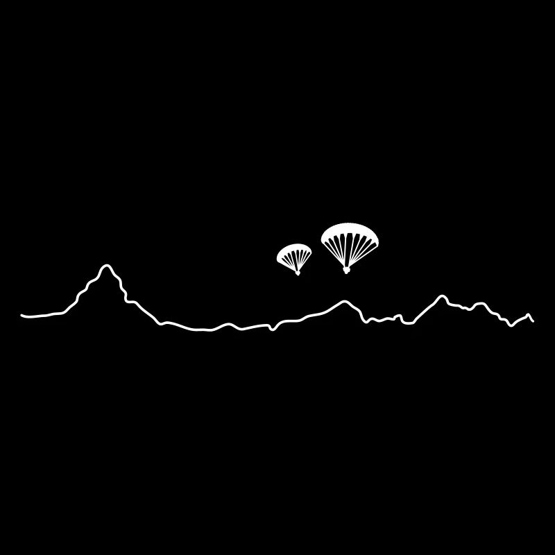 2 Paraglider über Bergkulisse
