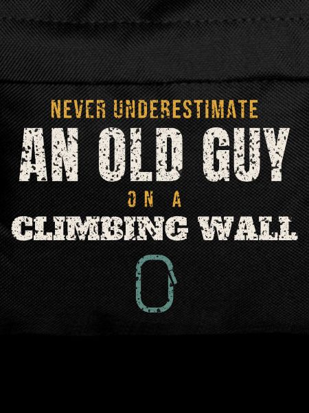 Old Guy On A Climbing Wall