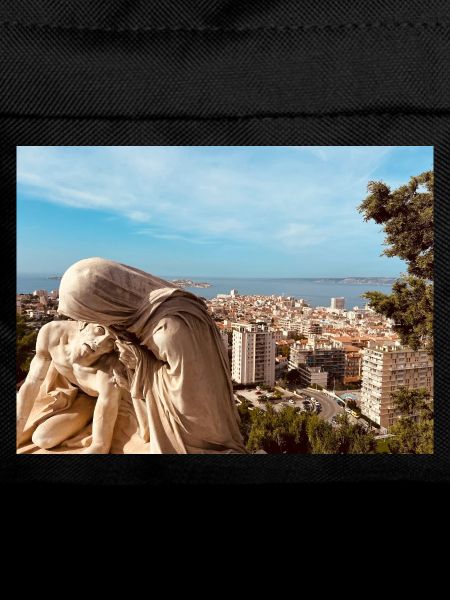 Classic sculpture over the city