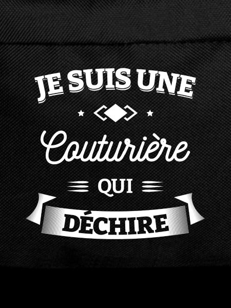 COUTURIÈRE QUI DÉCHIRE